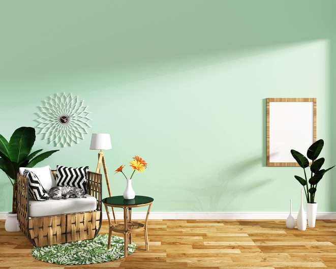 tropical design,armchair,plant,cabinet on dark wood tile floor and white background.3 d rendering